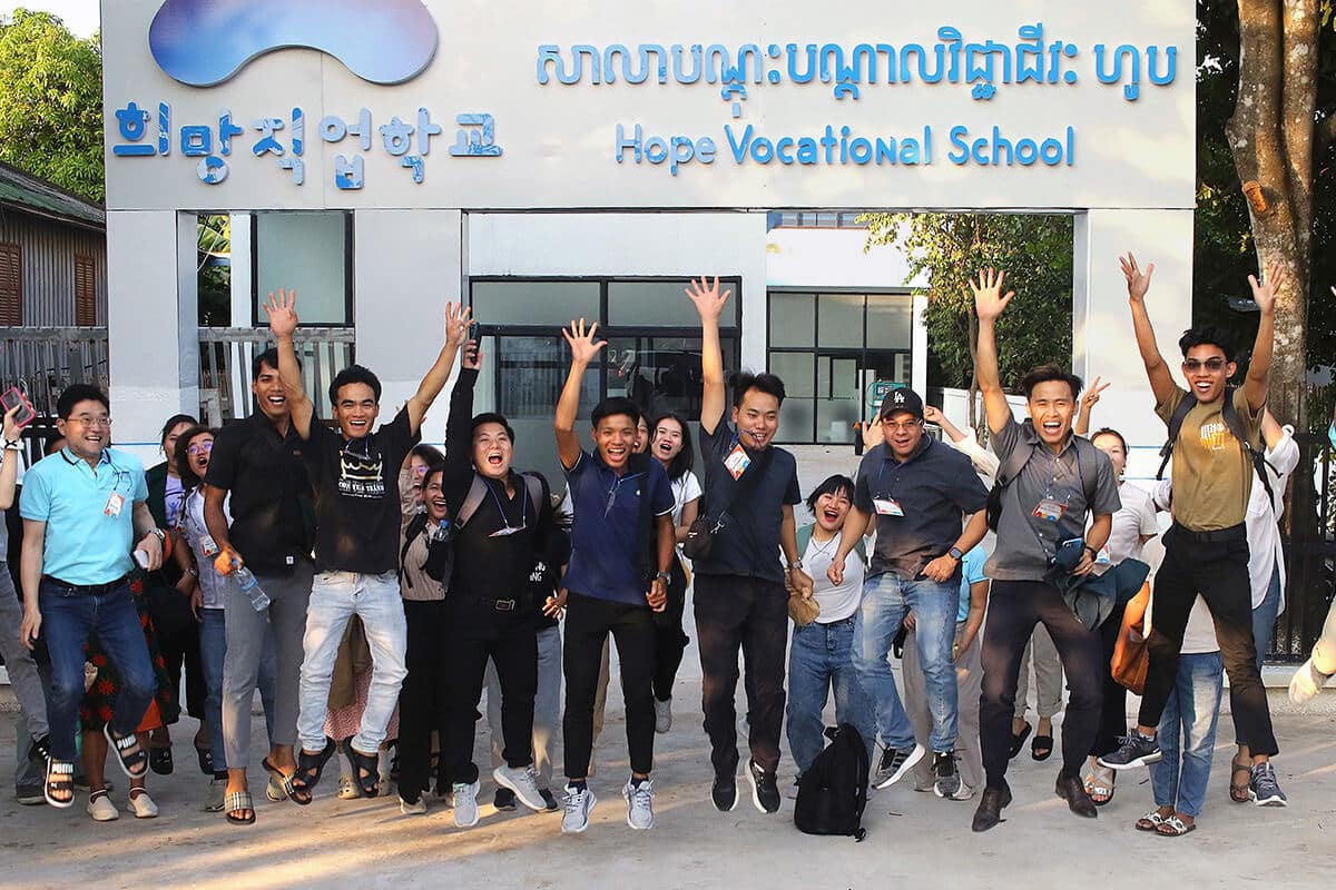 Participants and facilitators of 2024 ASCEND, a global leadership development training for Methodist young adults in Asia, jump for a photo at Hope Vocational School in Phnom Penh, Cambodia on Nov. 4. Photo by the Rev. Thomas E. Kim, UM News.