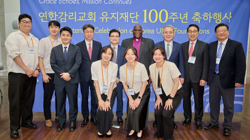 Asia Pacific Region of Global Ministries staff pose with Bishop Gregory V. Palmer, Mr. Chang Won Lee (board chair, Foundation of United Methodist World Mission–Korea), Rev. Young Min Paik (executive director, GBHEM Lead Asia-Pacific Hub), and other volunteers and partners who supported the centennial celebration. PHOTO: Courtesy of Paul Kong